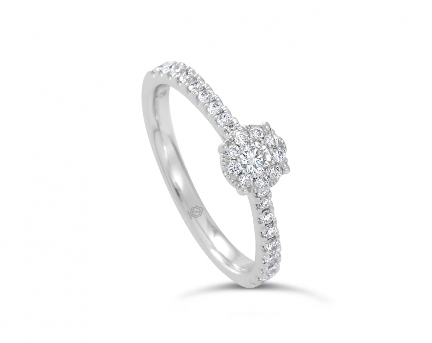18k white gold cathedral halo illusion set engagement ring with round pave set sidestones