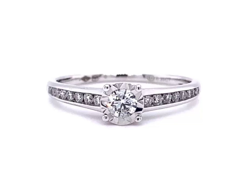 18k white gold illusion set round cut diamond engagement ring with side diamonds in chanel set 0,35tcw Photos & images