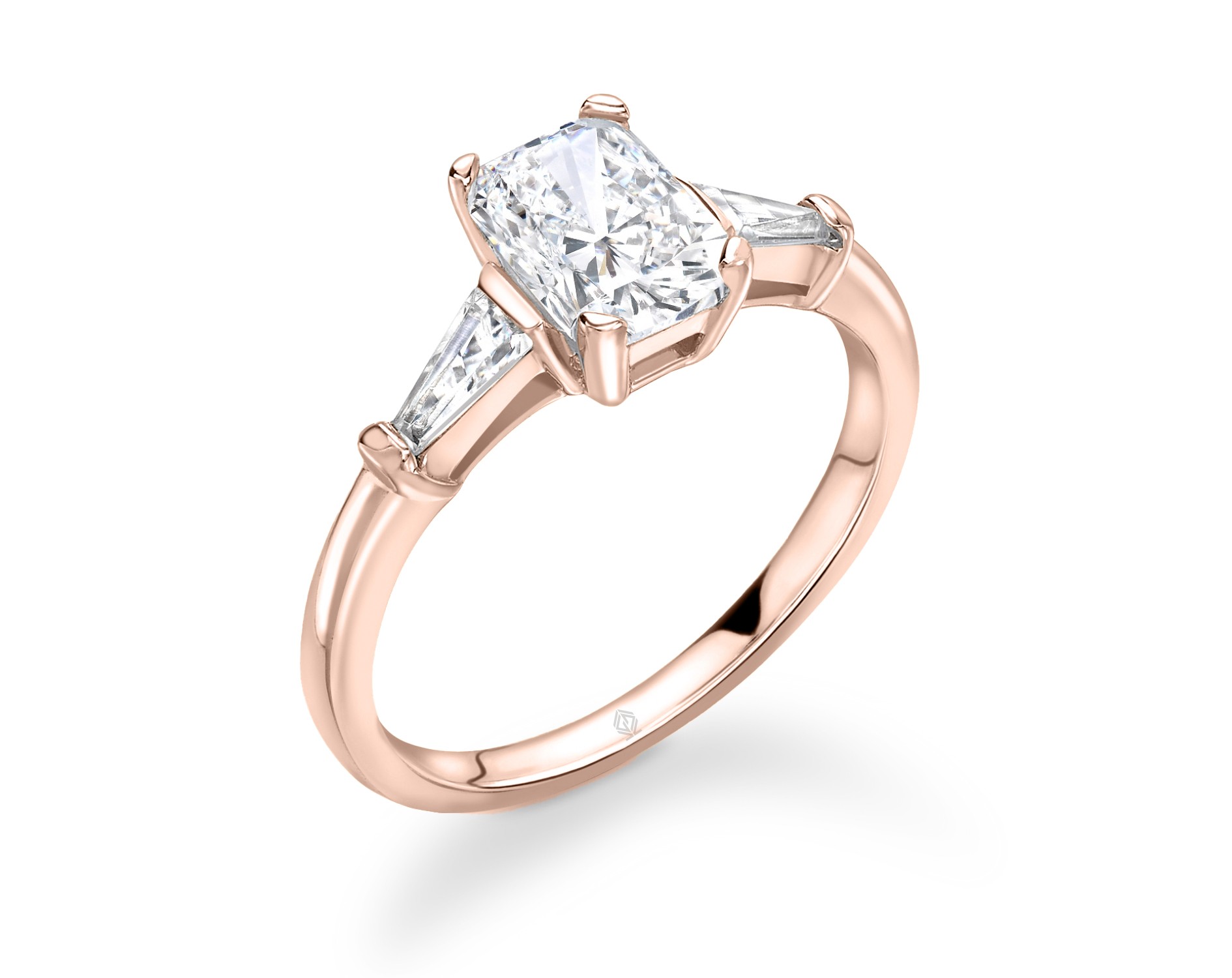 18K ROSE GOLD EMERALD CUT DIAMOND RING WITH BAGUETTES CUT SIDE STONES